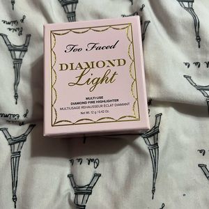 Too faced diamond light highlighter new never been used